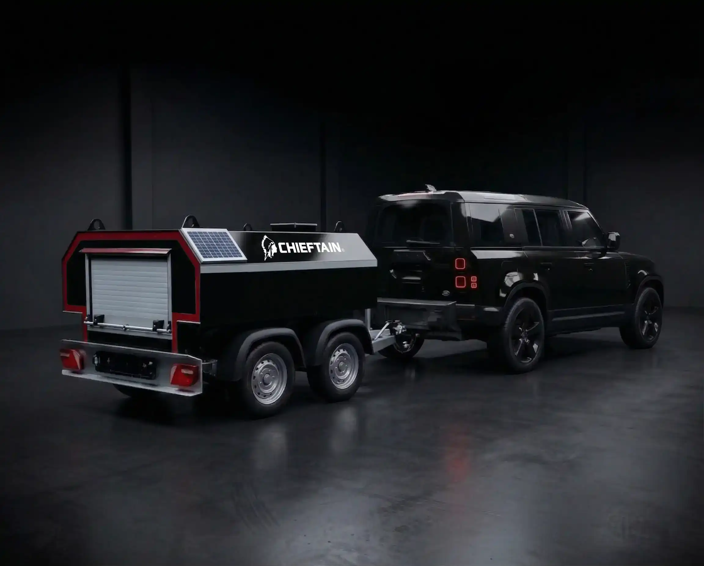 Chieftain fuel bowser towed by black Land Rover Defender